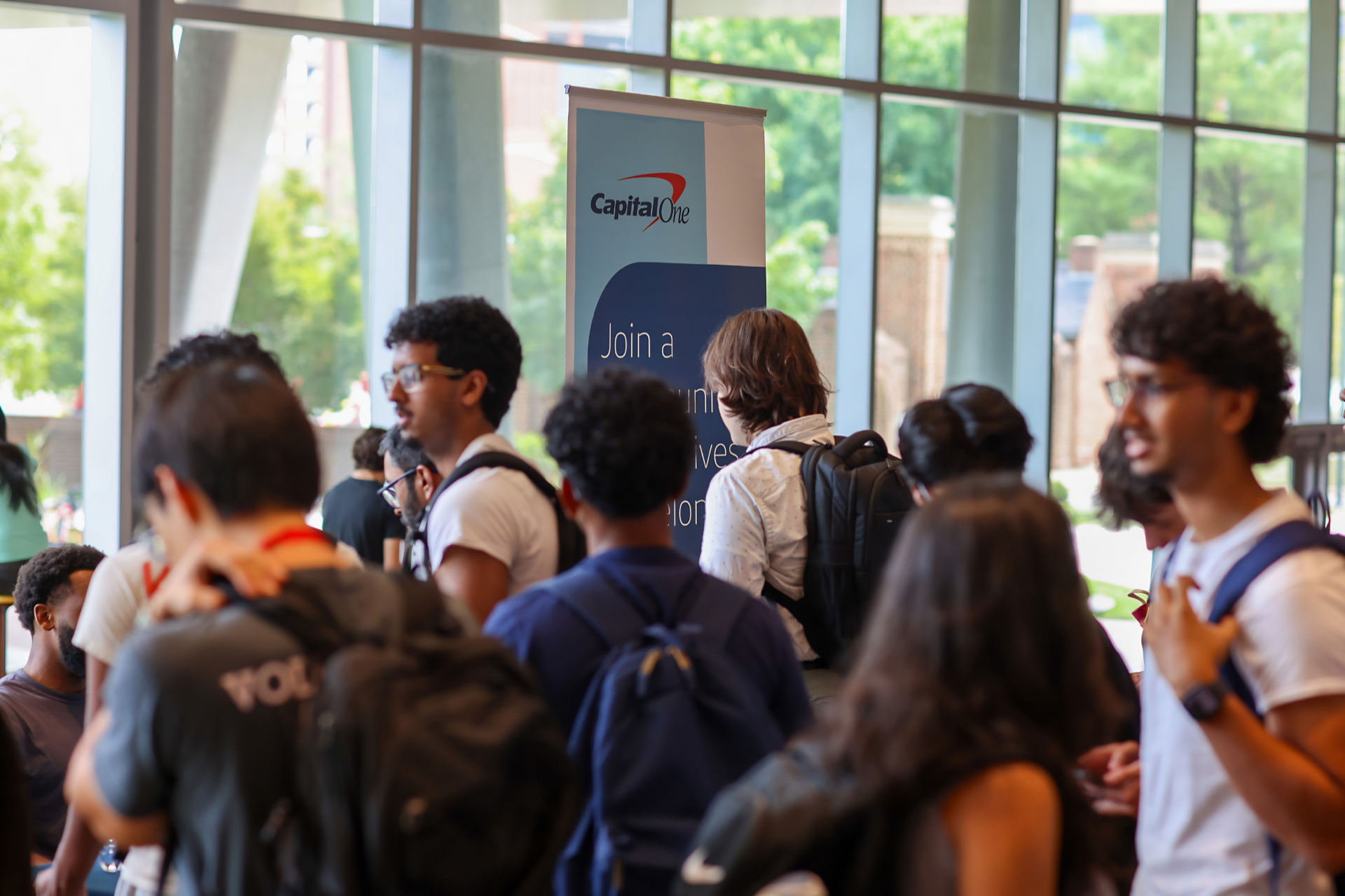 photo of group of students in the Iribe lobby