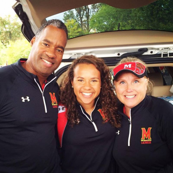 photo of Alex (center) with her father, Wendell, and her mother, Kimberly.