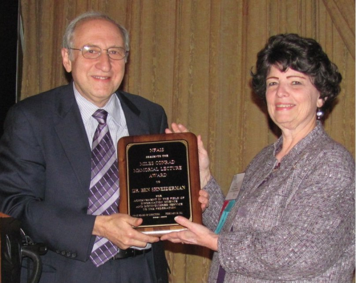 Ben Shneiderman receiving award holding plaque