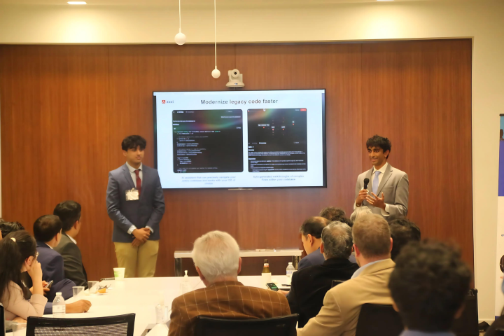photo of Nand Vinchhi, left, and Samai Patel, right, present at the TiE DC conference, where they were among the youngest presenters at the event attended by Fortune 500 CEOs on Thursday, September 26, 2024 .