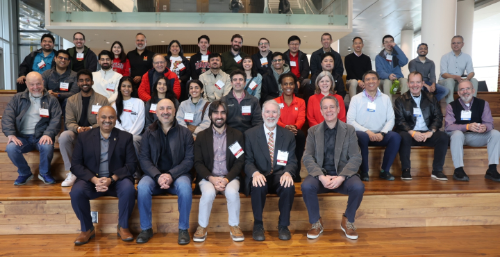 photo of Computer science alumni gather for a group photo at the Brendan Iribe Center for Computer Science and Engineering in College Park, Maryland, on Saturday, April 12, 2025.