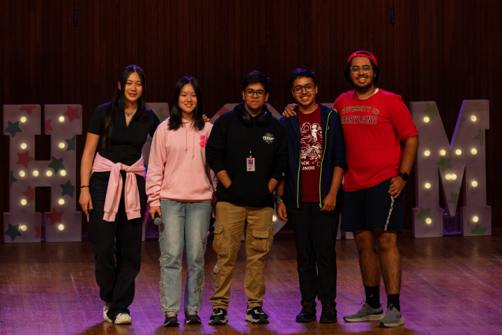 photo of Vitthal Agarwal, center, stands on stage during the award ceremony for HackMIT at the MIT Kresge Auditorium on Sunday, Sept. 15, 2024.