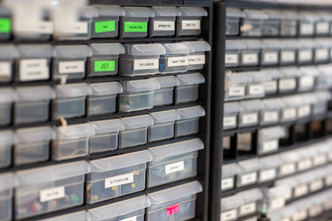 Electronic components in a rack of storage drawers