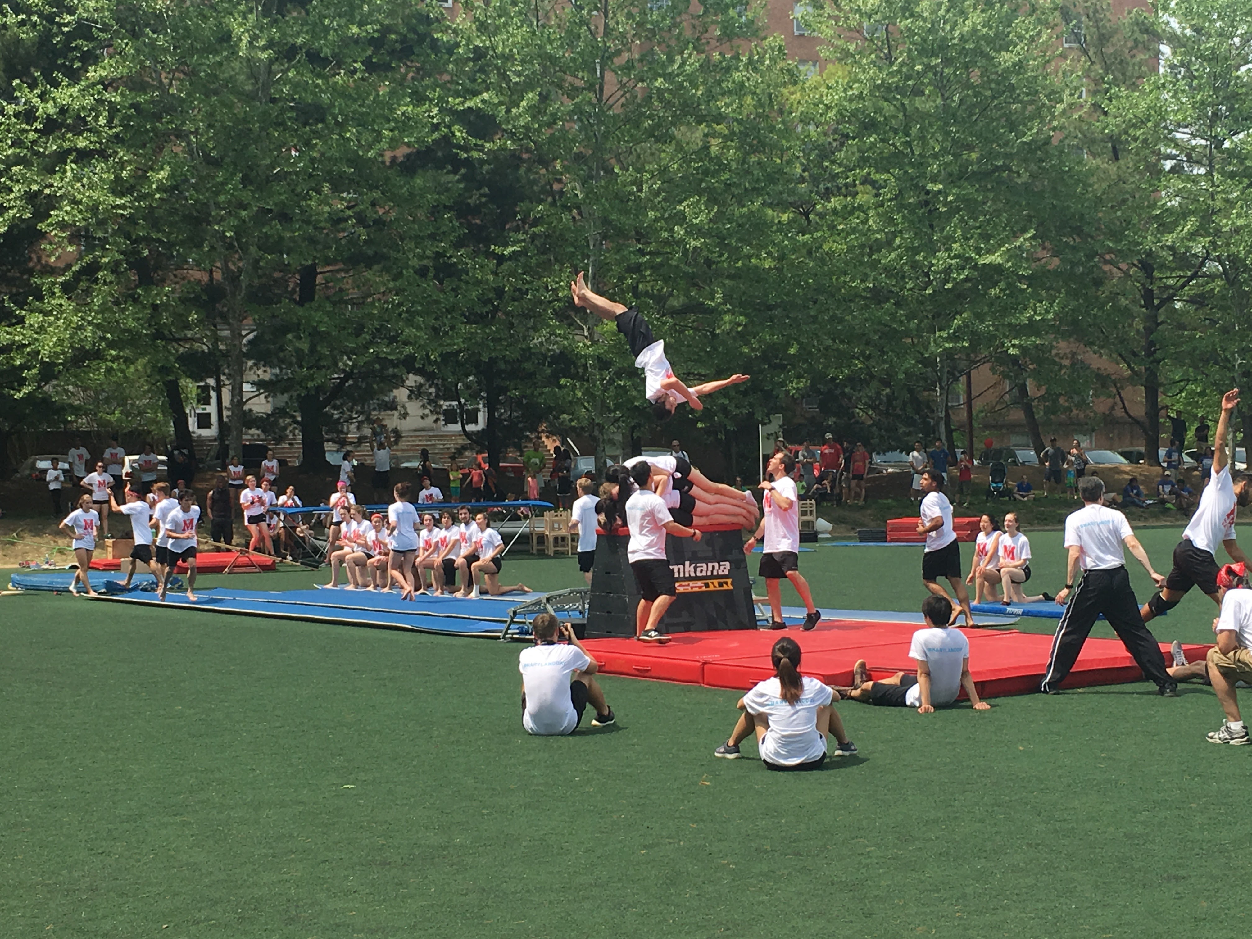 Members of Gymkana perform by balancing wooden chairs into different formations and then doing handstands on top of the chairs. This was one of the acts during Gymkana's Maryland Day performance on Saturday, April 29, 2017 in College Park.  (Abby Mergenmeier)